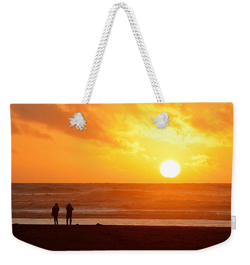 Scenic Weekender Tote Bag featuring the photograph Catching a Setting Sun by AJ Schibig