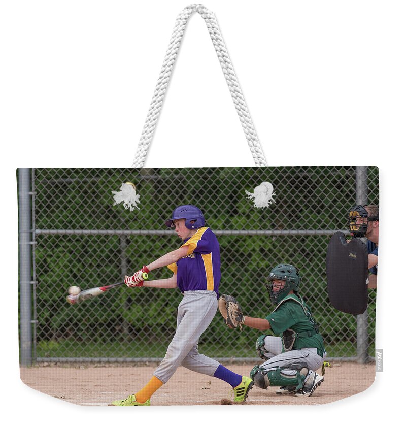  Weekender Tote Bag featuring the photograph Catching II by James Meyer