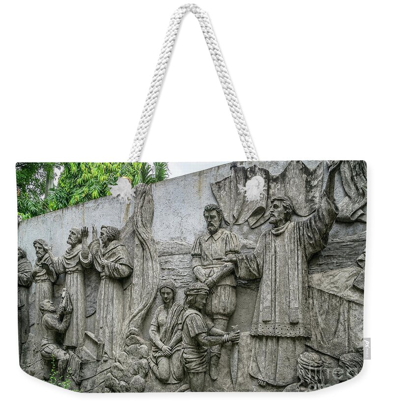 Catholic Weekender Tote Bag featuring the photograph Cebu Carvings by Adrian Evans