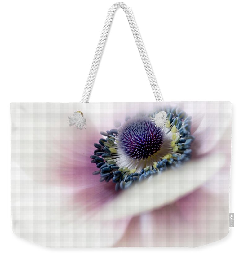 Flower Weekender Tote Bag featuring the photograph Center of attention. by Usha Peddamatham