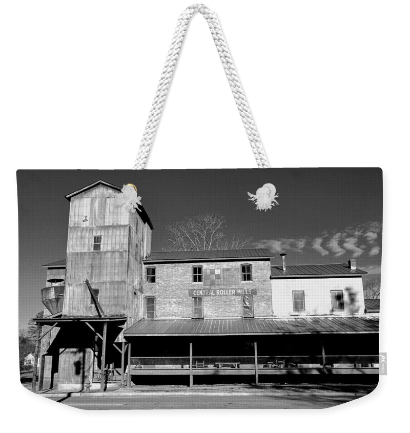  Weekender Tote Bag featuring the photograph Central Roller Mill by Rodney Lee Williams