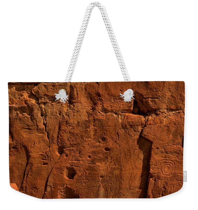 Chaco Canyon Weekender Tote Bag featuring the photograph Chaco Culture Petroglyph Panel by Adam Jewell