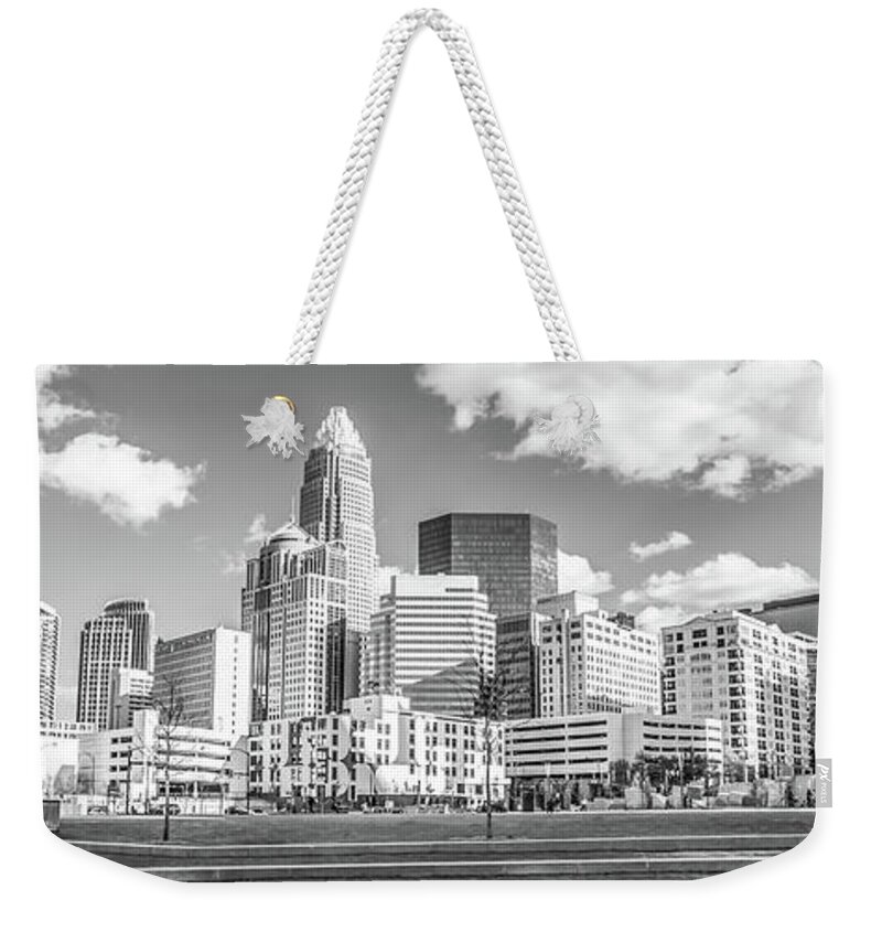 121 West Trade Weekender Tote Bag featuring the photograph Charlotte Skyline Panorama Black and White Image by Paul Velgos