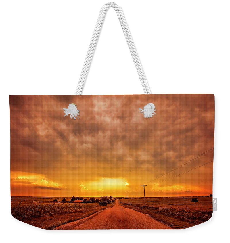 Landscape Weekender Tote Bag featuring the photograph Chasing the Sunset by Toni Hopper