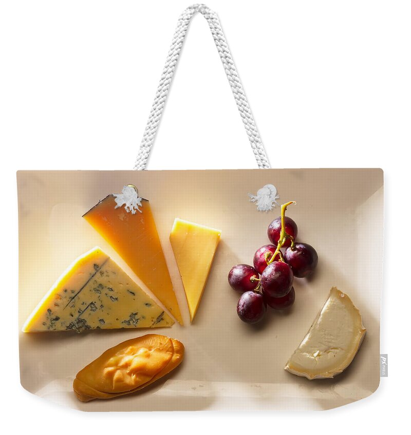 Cheddar Weekender Tote Bag featuring the photograph Cheese Plate by Anastasy Yarmolovich