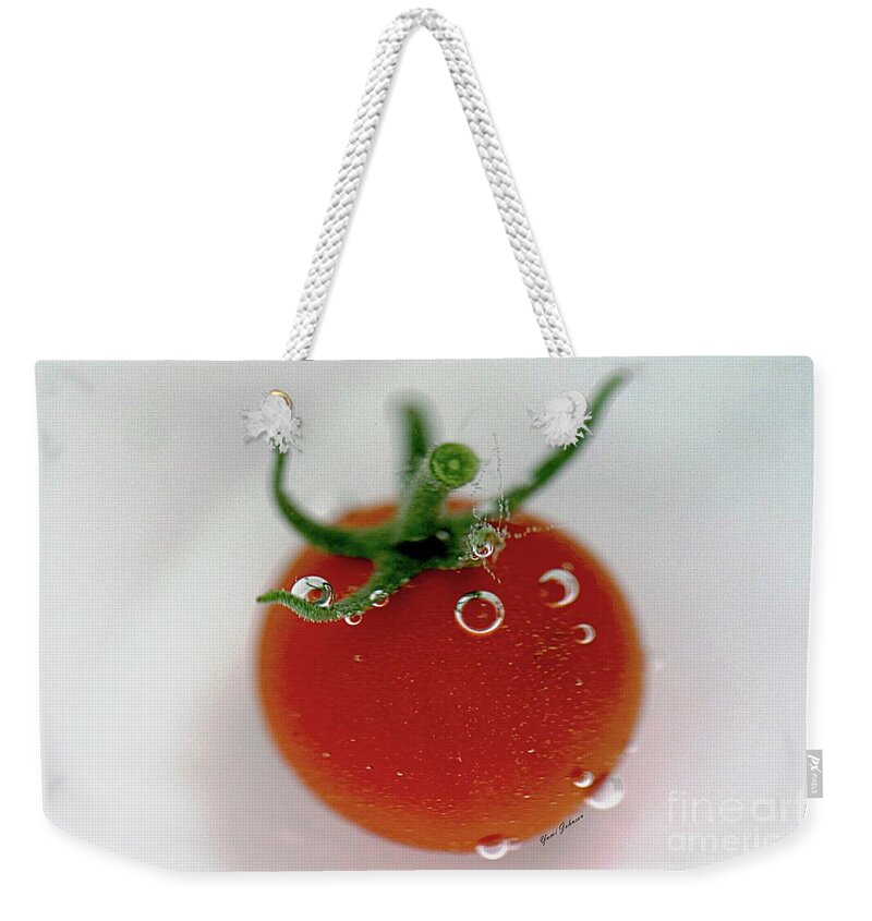 Cherry Tomato Weekender Tote Bag featuring the photograph Cherry Tomato in water by Yumi Johnson