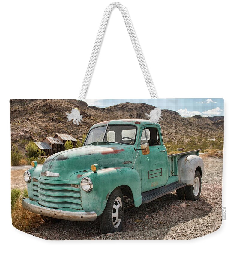 Nelson Weekender Tote Bag featuring the photograph Chevy Truck In The Desert by Kristia Adams