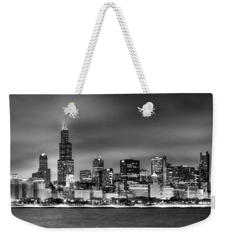 Chicago Skyline Weekender Tote Bag featuring the photograph Chicago Skyline at NIGHT black and white by Jon Holiday