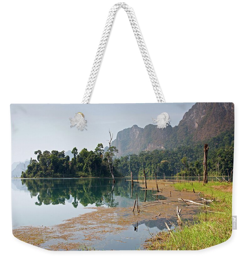 Cheow Lan Lake Weekender Tote Bag featuring the photograph Cheow Lan Lake Morning, Khao Sok by Aivar Mikko