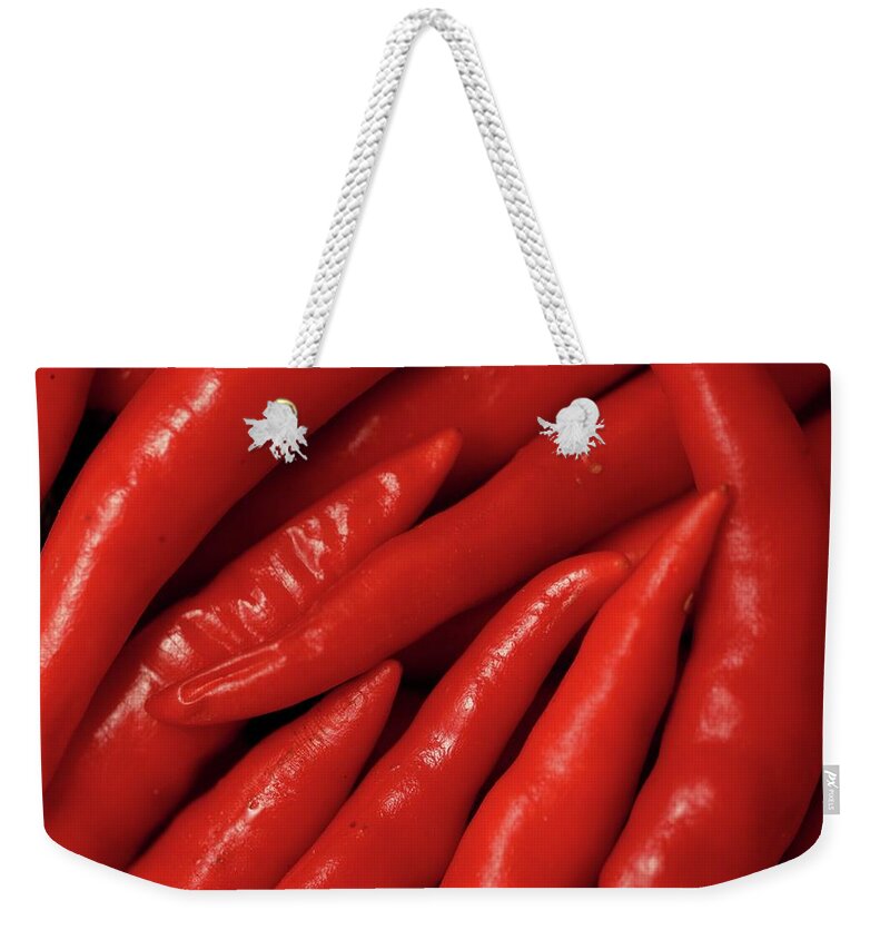 Chili Pepper Hot Weekender Tote Bag featuring the photograph Chilis Landscape by Ian Sanders