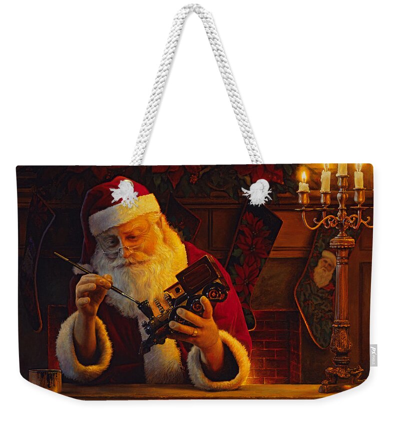 Christmas Weekender Tote Bag featuring the painting Christmas Eve Touch Up by Greg Olsen