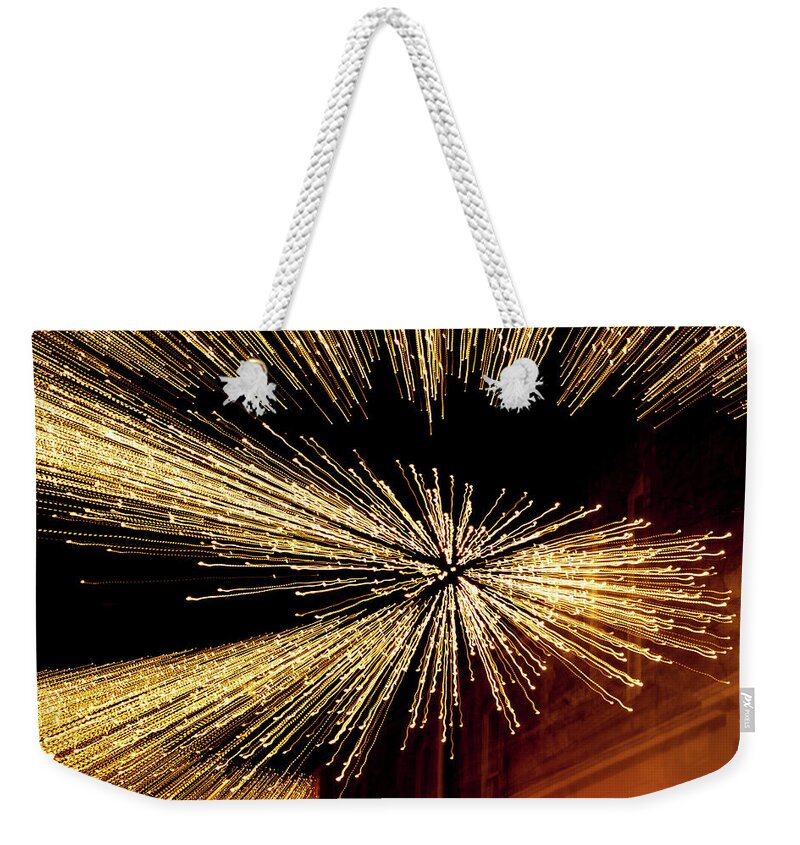 Helen Northcott Weekender Tote Bag featuring the photograph Christmas Lights Zoom Blur ii by Helen Jackson