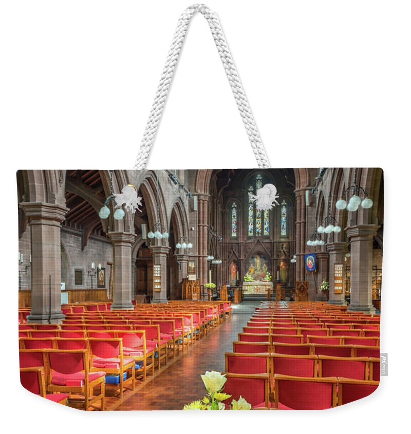Catholic Weekender Tote Bag featuring the photograph Church Flowers by Adrian Evans