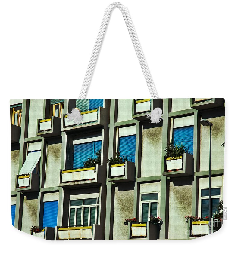 City Weekender Tote Bag featuring the photograph City balconies by Silvia Ganora