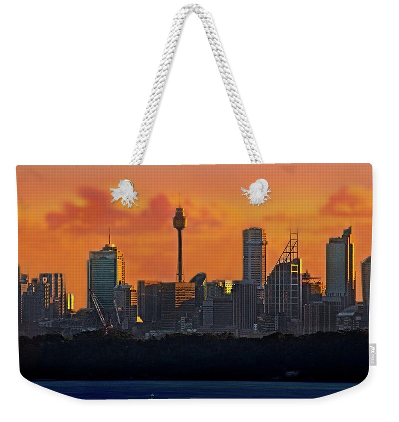 North Head Weekender Tote Bag featuring the photograph CIty Of Sydney And Orange Clouds by Miroslava Jurcik