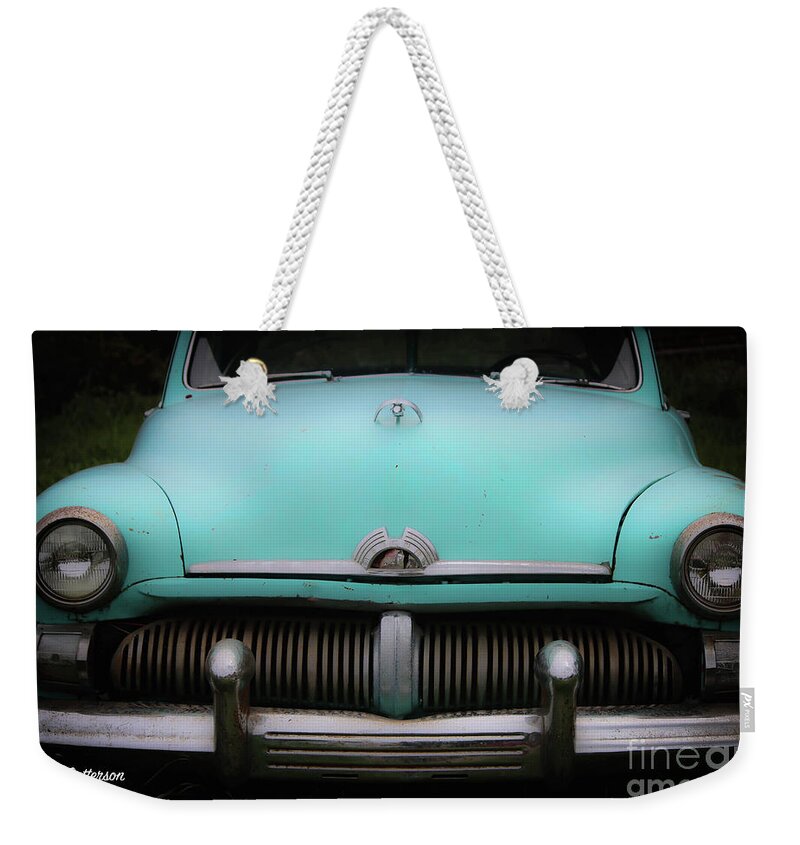 Mercury Weekender Tote Bag featuring the photograph Classic Mercury by Veronica Batterson