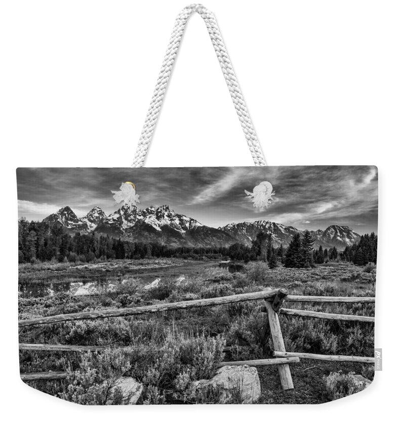Fence Line Weekender Tote Bag featuring the photograph Classic Tetons by Darren White
