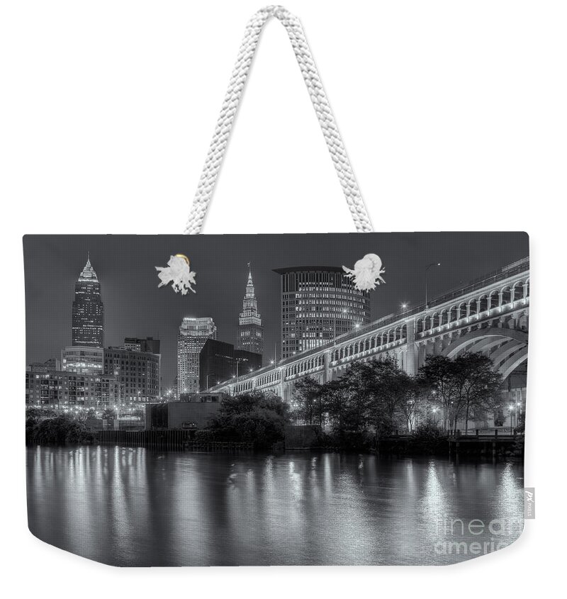 Clarence Holmes Weekender Tote Bag featuring the photograph Cleveland Night Skyline III by Clarence Holmes
