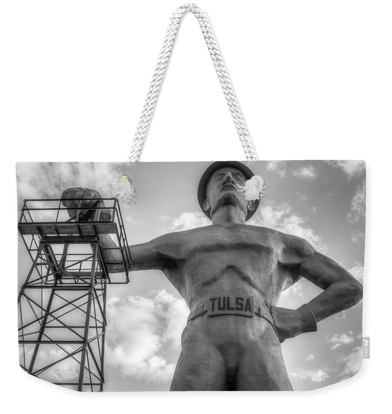 American Weekender Tote Bag featuring the photograph Close Up of Tulsa Driller Statue - Black and White by Gregory Ballos