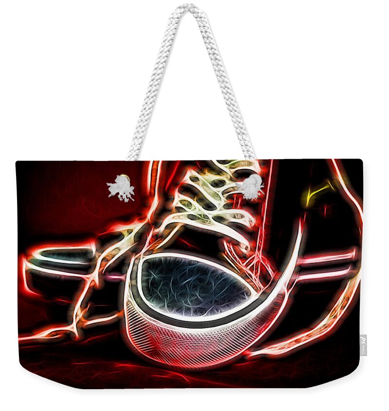 Background Weekender Tote Bag featuring the photograph Closeup of Red Canvas Trainers by John Williams