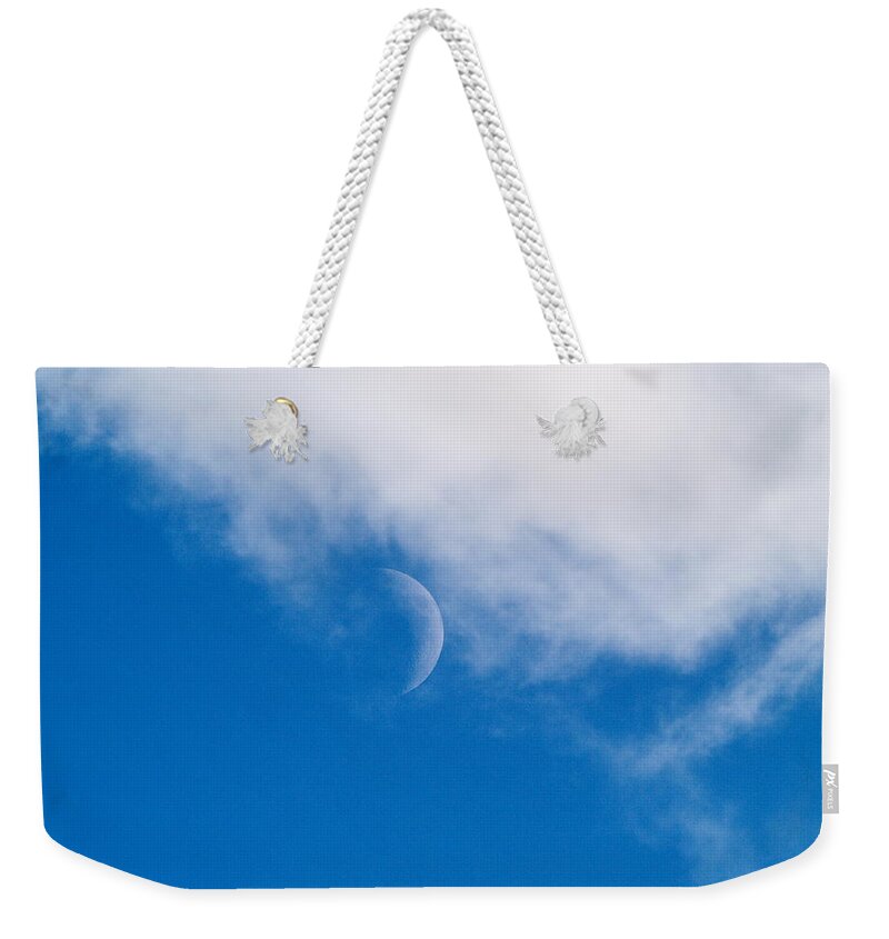 December Skies Weekender Tote Bag featuring the photograph Cloud Catching Moon				 by Richard Thomas