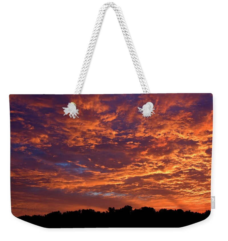 Goldenl Sunrise Weekender Tote Bag featuring the photograph Cloud Filled Sunrise by Sally Weigand
