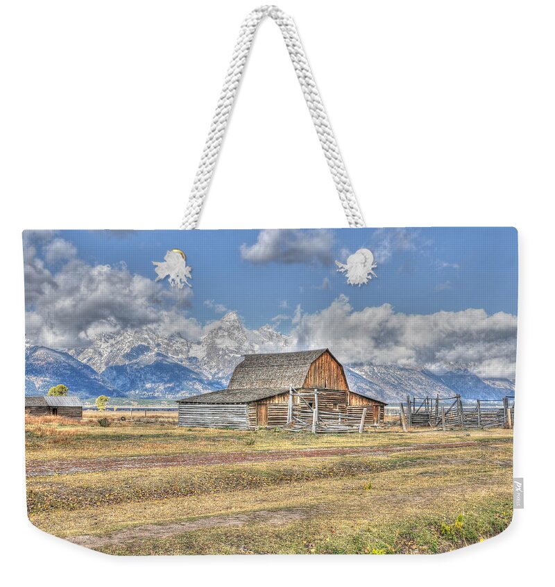Teton Weekender Tote Bag featuring the photograph Clouds and Barn by David Armstrong