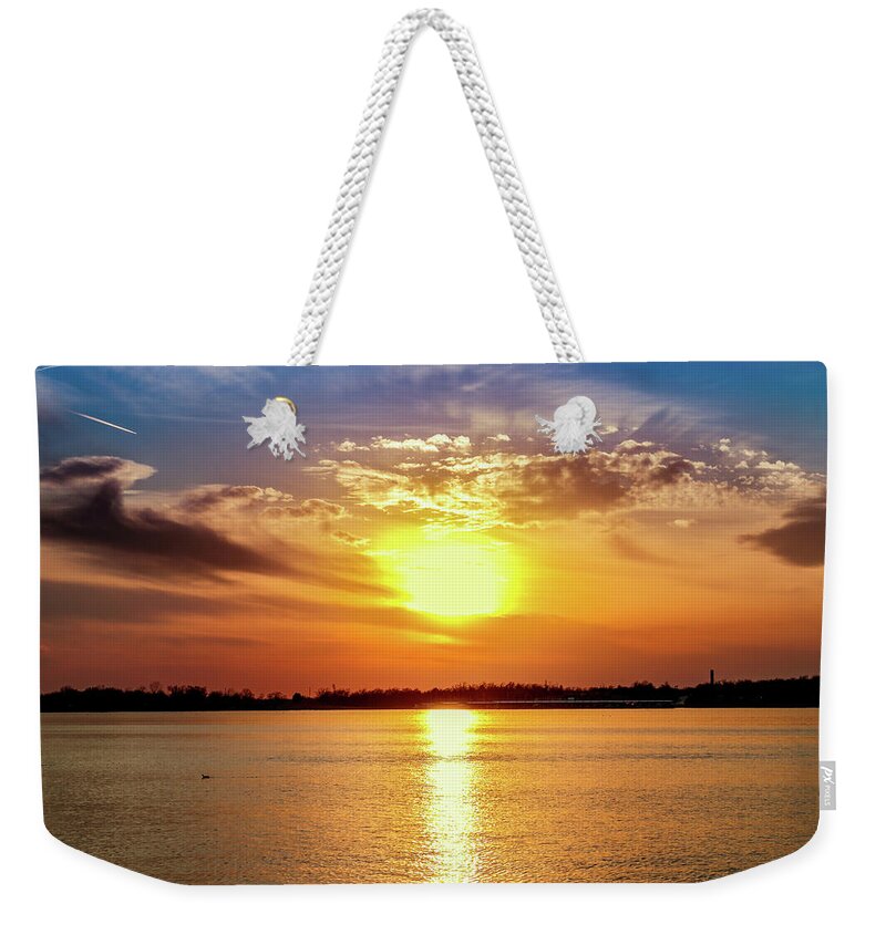 Cloudy Weekender Tote Bag featuring the photograph Clouds at Sunset by Doug Long