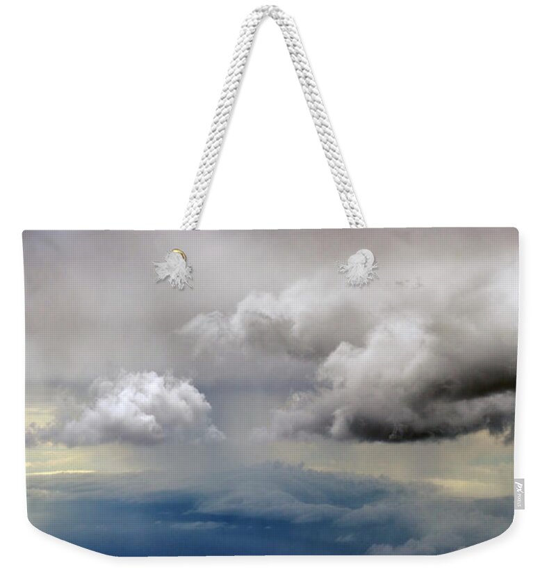 Clouds Weekender Tote Bag featuring the photograph Clouds by Christopher Johnson