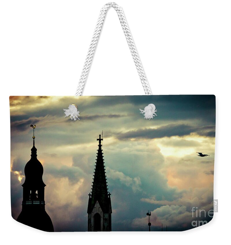 Cities Weekender Tote Bag featuring the photograph Cloudscape sunset old town Riga Latvia by Raimond Klavins