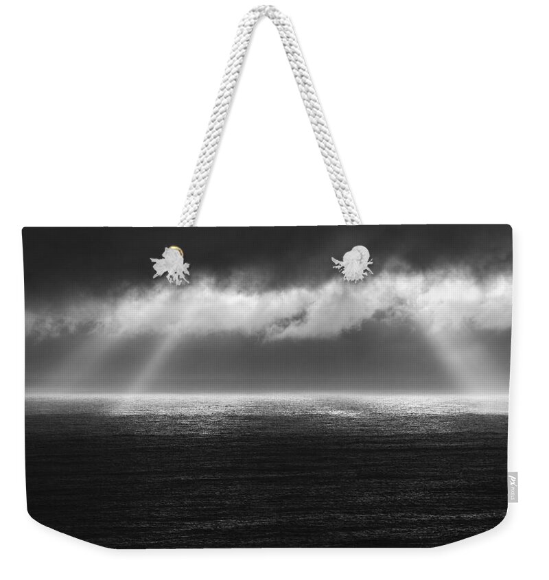 Water Weekender Tote Bag featuring the photograph Cloudy day at the sae by Gunnar Orn Arnason