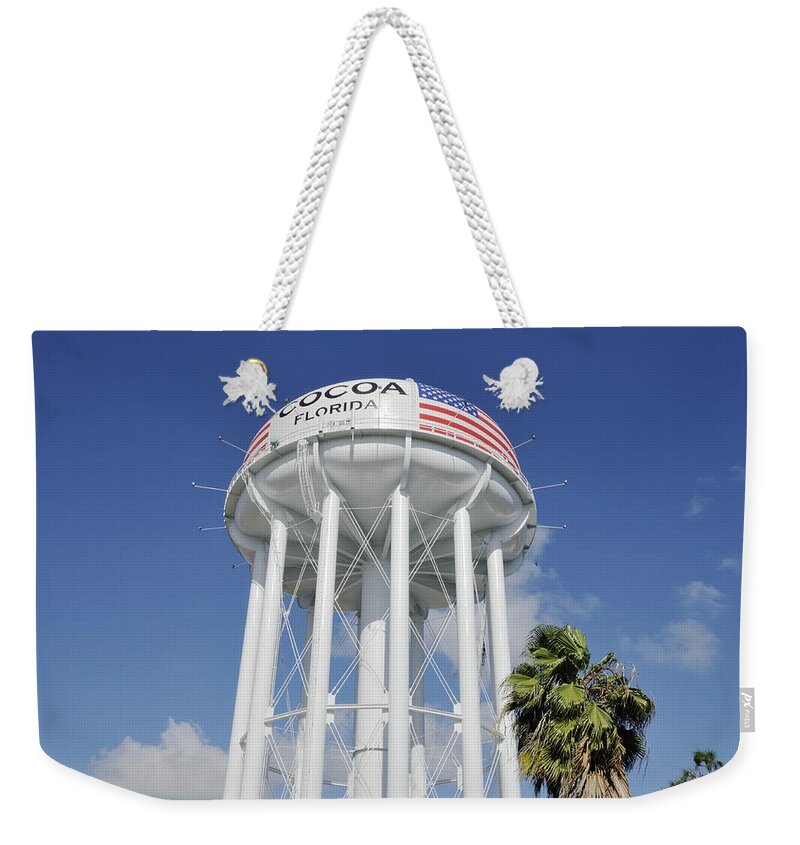 Water Tower Weekender Tote Bag featuring the photograph Cocoa Water Tower with American Flag by Bradford Martin