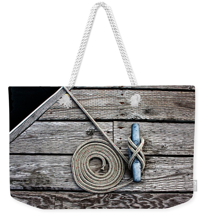 Mooring Weekender Tote Bag featuring the photograph Coiled Mooring Line and Cleat by Carol Leigh