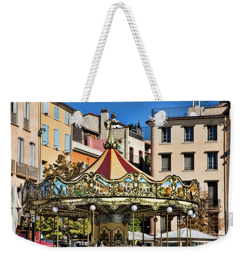 France Weekender Tote Bag featuring the photograph Color Carousal Perpignan France by Chuck Kuhn