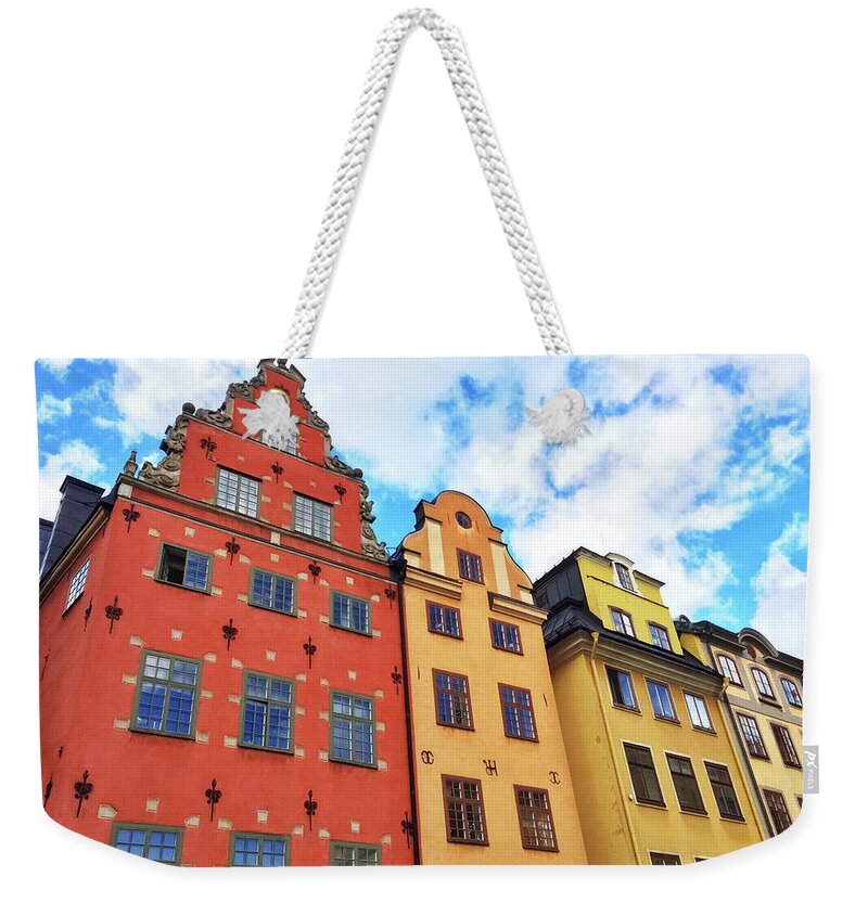 Stockholm Weekender Tote Bag featuring the photograph Colorful buildings in Gamla Stan, Stockholm by GoodMood Art