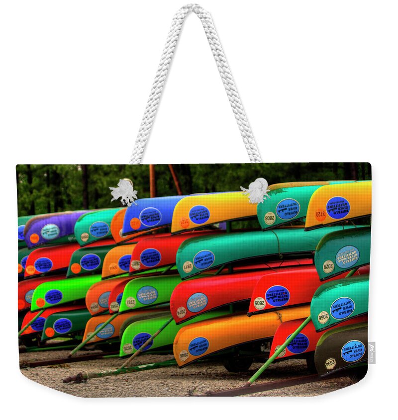 Canoe Weekender Tote Bag featuring the pyrography Colorful Canoes by Ester McGuire