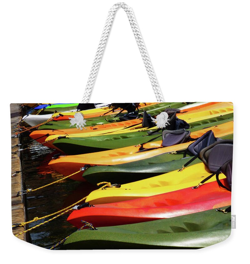 Kayak Weekender Tote Bag featuring the photograph Colorful Kayaks by Marcia Socolik