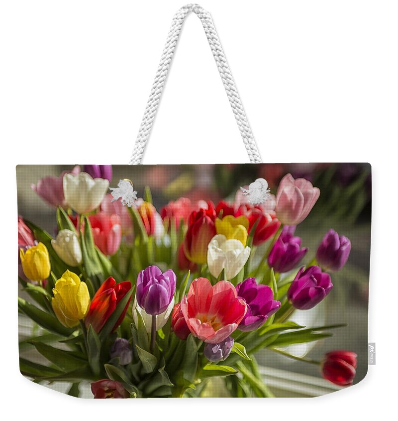 Spring Weekender Tote Bag featuring the photograph Colorful tulips by Patricia Hofmeester