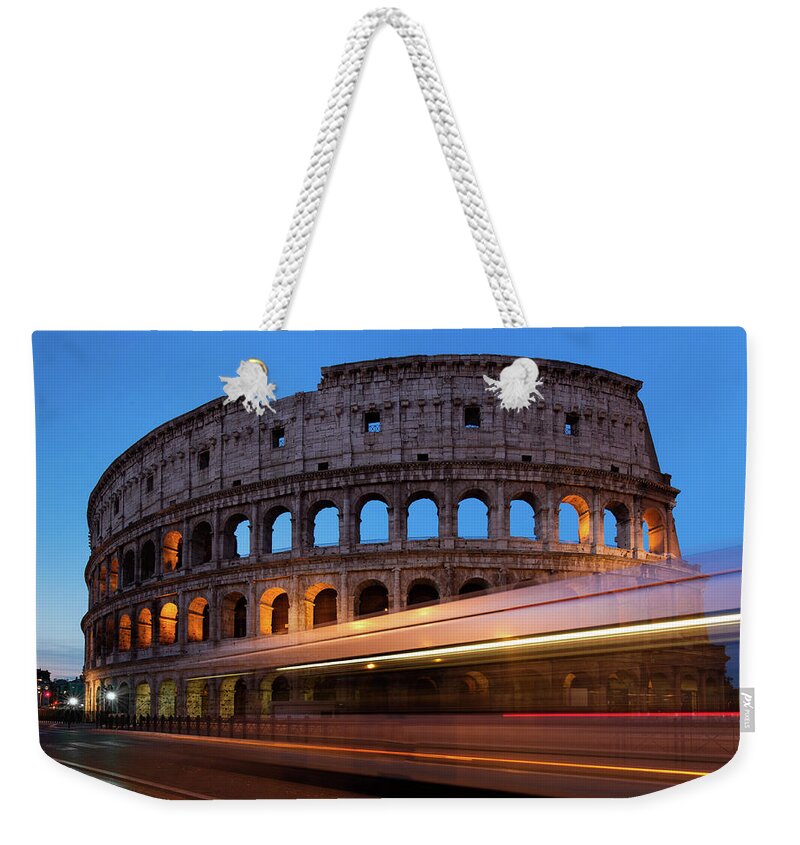 Colosseum Weekender Tote Bag featuring the photograph Colosseum Rush by Rob Davies
