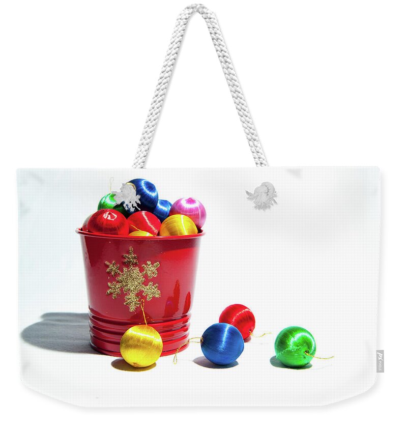 Helen Northcott Weekender Tote Bag featuring the photograph Coloured Baubles in a Pot by Helen Jackson