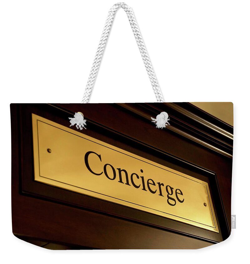 Concierge Weekender Tote Bag featuring the photograph Concierge sign by Dutourdumonde Photography