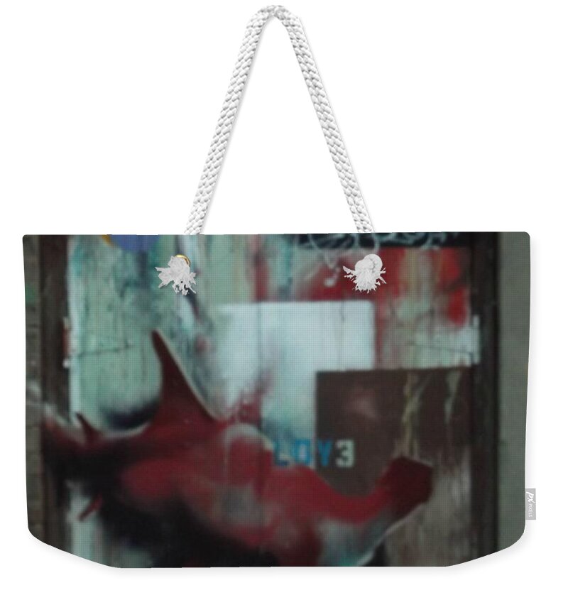  Weekender Tote Bag featuring the photograph Confused by Kelly Awad