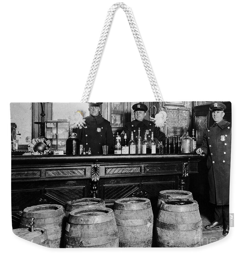 Prohibition Weekender Tote Bag featuring the photograph Cops at the Bar by Jon Neidert