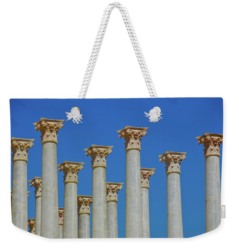 Corinthian Columns Weekender Tote Bag featuring the photograph Corinthian Columns by Harry Spitz