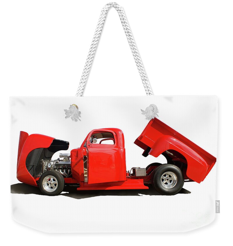 Costume Weekender Tote Bag featuring the photograph Costume Red Truck by Anthony Totah