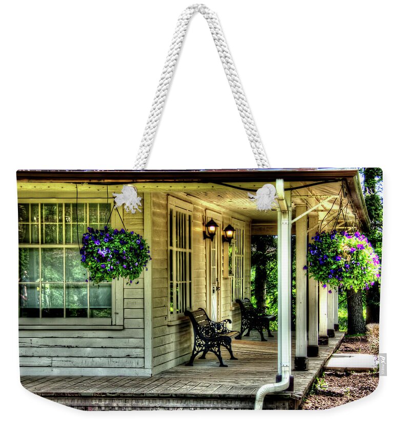 White Cottage Weekender Tote Bag featuring the photograph Cottage Porch by Leslie Montgomery