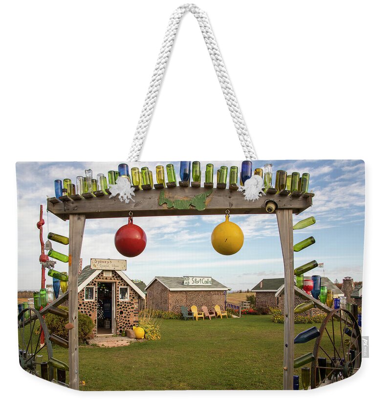 Atttraction Weekender Tote Bag featuring the photograph Cottages at Hannahs Bottle Village, PEI, Canada by Karen Foley