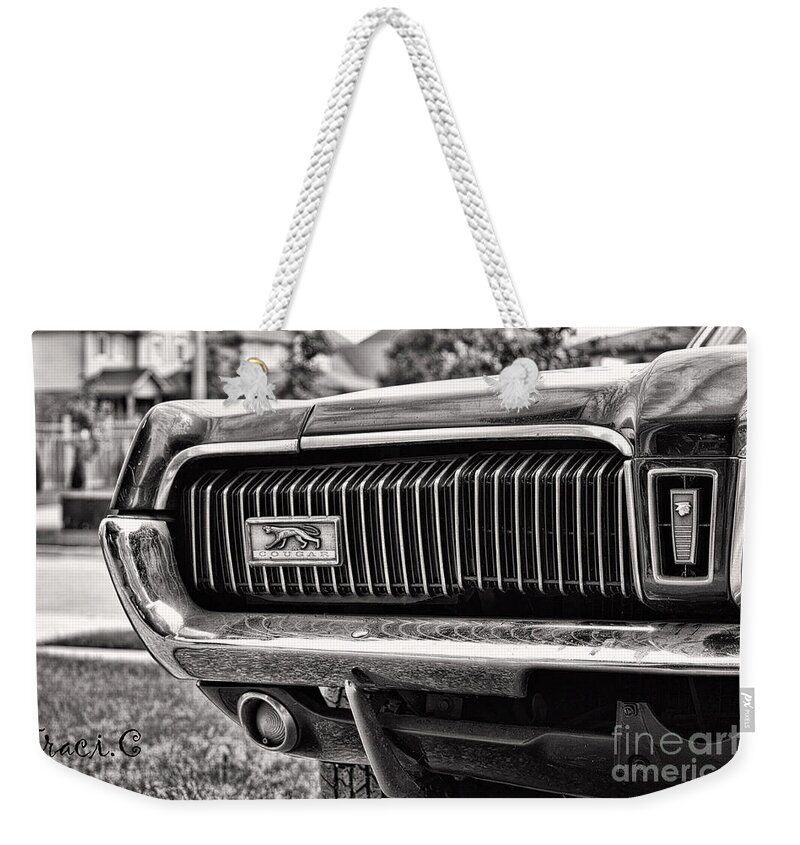 Mercury Weekender Tote Bag featuring the photograph Cougar End by Traci Cottingham