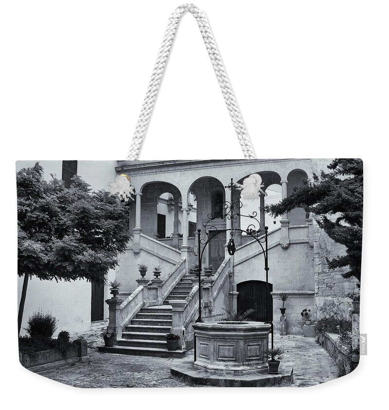 Garden Weekender Tote Bag featuring the photograph Courtyard Garden Momochrome by Jeff Townsend