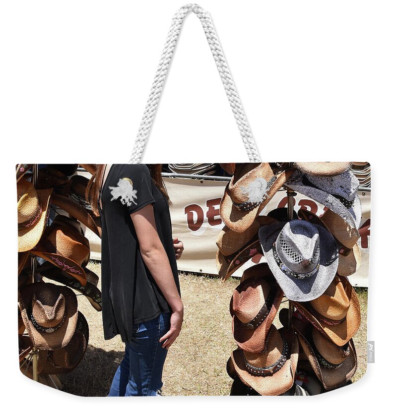 Cow Girl And Cowgirl Hats Weekender Tote Bag featuring the photograph Cow Girl and Cowgirl Hats by Floyd Snyder